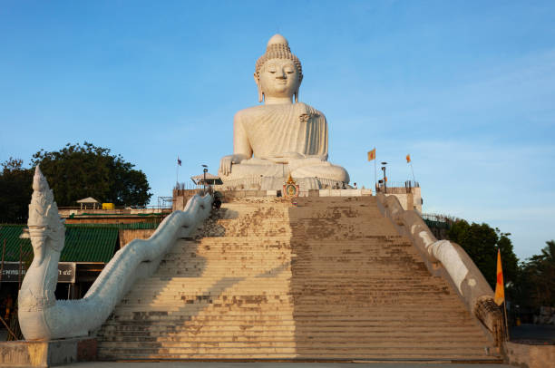istock Big buddha on blue sky background in phuket thailand 1083160878