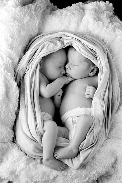 Photo of my premature twin girls born eight weeks earlier. Their height is 42 cm, weight - 1.7 kg.