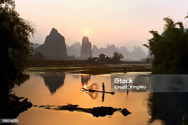 Yangshuo Li River At Sunset Stock Photo - Download Image Now - Bamboo - Plant, Beauty In Nature, Chinese Culture