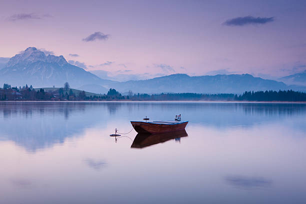 istock tranquil scene with boat at lake hopfensee 108316565
