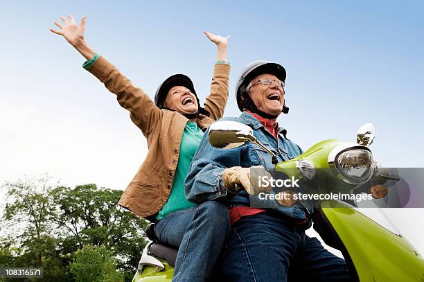 Senior Couple On Scooter Stock Photo - Download Image Now - Senior Adult, Fun, Motorcycle