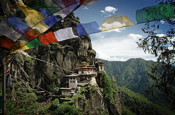 The old Bhutanese temples are in the beautiful valley among Himalaya Mountain. This is wonderful tourist attraction. The view like a dream.