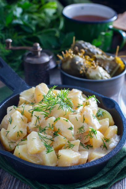 istock fresh potatoes cooked in sour cream, selective focus 1083227856
