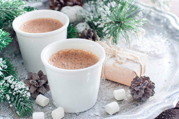 istock Hot chocolate in white glasses on a tray with New Year's decor, horizontal, copy space 1083230714