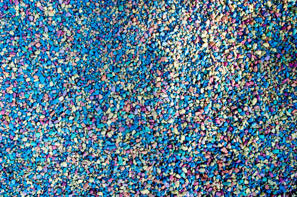 istock Colored pebbles from artificially colored small stones. Background 1083237146