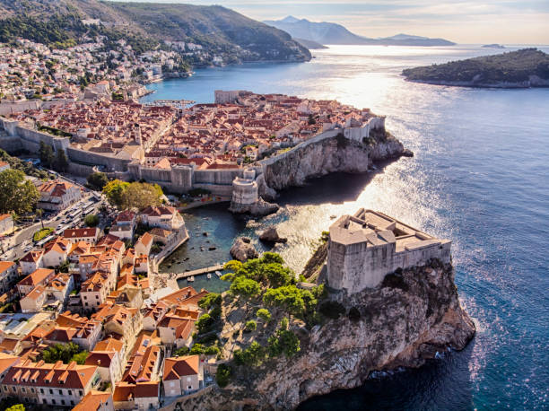 Old Town and Fort Lovrijenac aerial view in Dubrovnik Aerial view of Saint Lawrence Fortress and Dubrovnik old town city walls dubrovnik stock pictures, royalty-free photos & images
