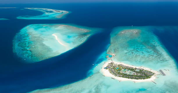 Fushifaru Lhaviyani Atoll, Maldives Beautiful huge aerial of the islands and sandbars of the stunning Fushifaru Lhaviyani Atoll, Maldives. Converted from RAW atoll stock pictures, royalty-free photos & images