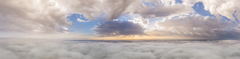 Panoramic landscape and view of a cumulonimbus storm cloud from a supercell thunderstorm in the Nebraska sandhills.