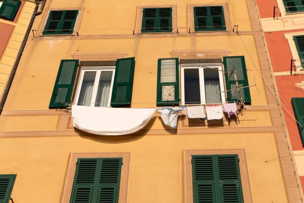 istock camogli house clothes drying to the sun 1083261400