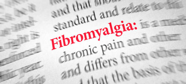 Definition of the word Fibromyalgia in a dictionary stock photo