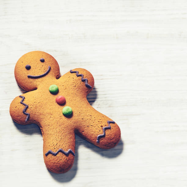 istock Gingerbread cookies over wooden background. 1083268592