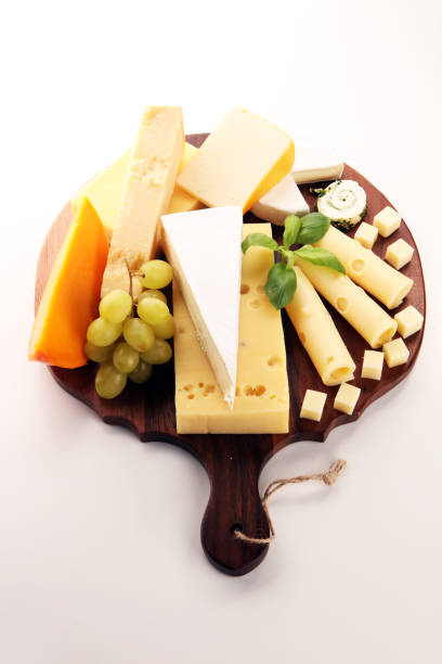 istock Cheese plate served with grapes, various cheese on a platter 1083273218