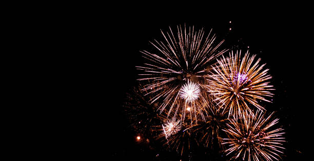 istock Beautiful fireworks sparkle full sky at night 1083273268
