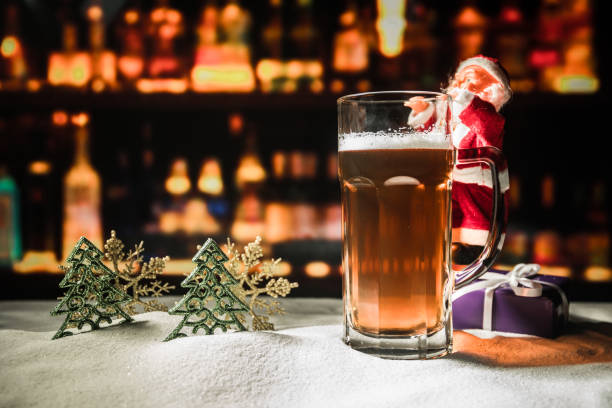 istock Christmas Beer on snow with decorative artwork 1083275384