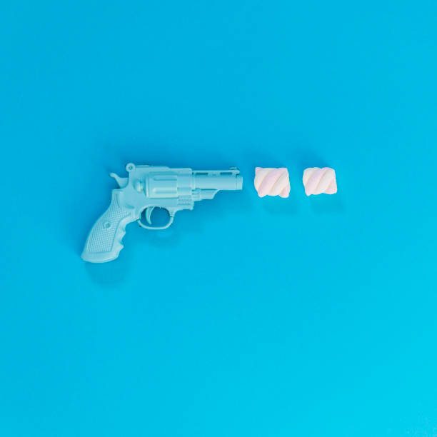 istock The gun fires two marshmallows instead of bullets 1083277370