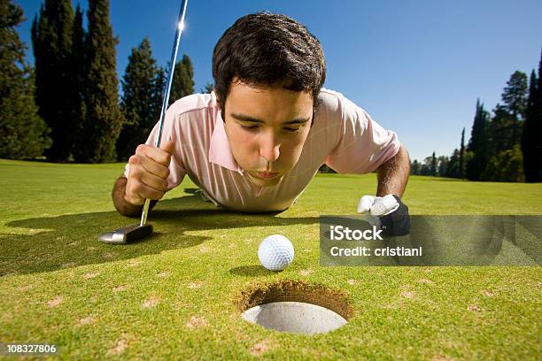 Foto de Jogador De Golfe e mais fotos de stock de Vista Frontal - Vista Frontal, Golfista, Soprar