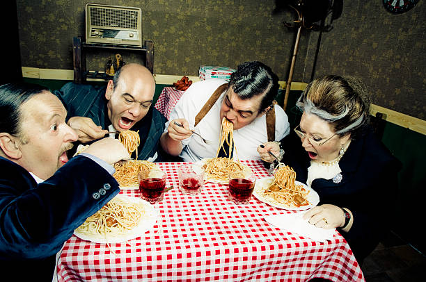 fome - eating senior adult color image spaghetti imagens e fotografias de stock