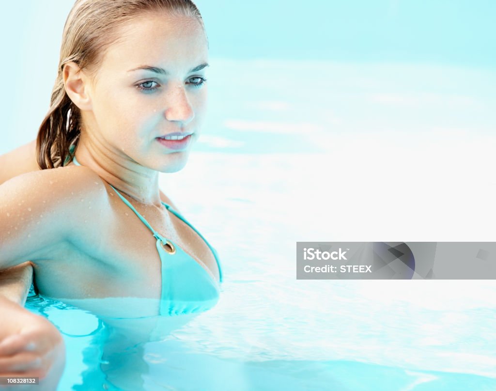 Attractive Thoughtful Female In A Swimming Pool Stock Photo ...