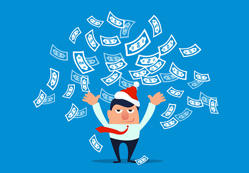 Businessman wearing christmas hat and throwing money
