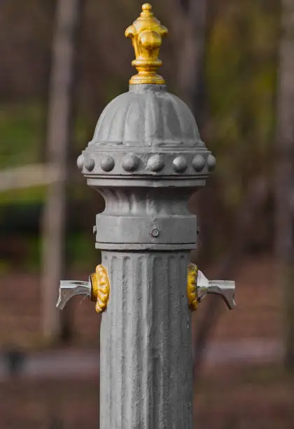 Vintage water fountain in a park.