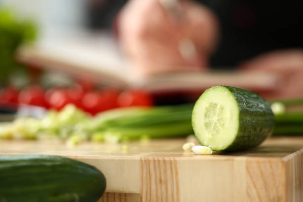 istock Cook holds knife in hand and cuts on 1083284098
