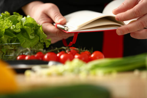 istock An open book of recipes on background 1083284100