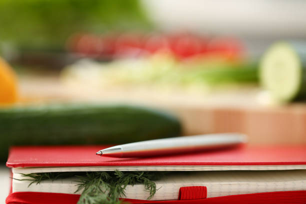 istock An open book of recipes on background 1083284104