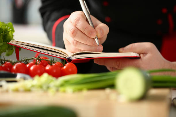 istock An open book of recipes on background 1083284144