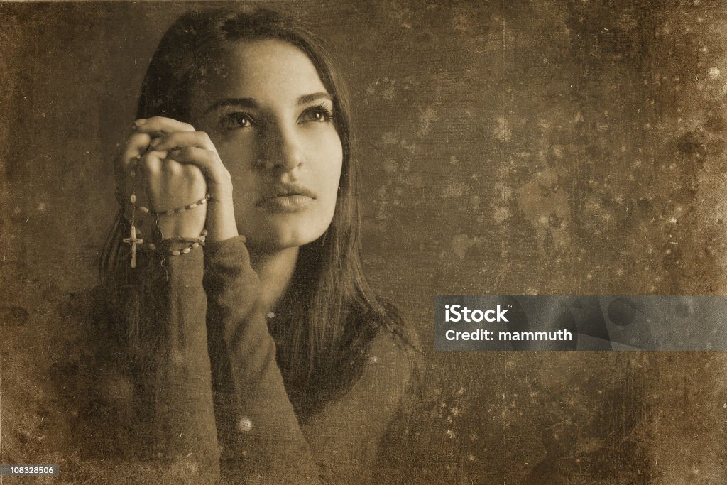 Catholic girl vintage photo  Praying Stock Photo