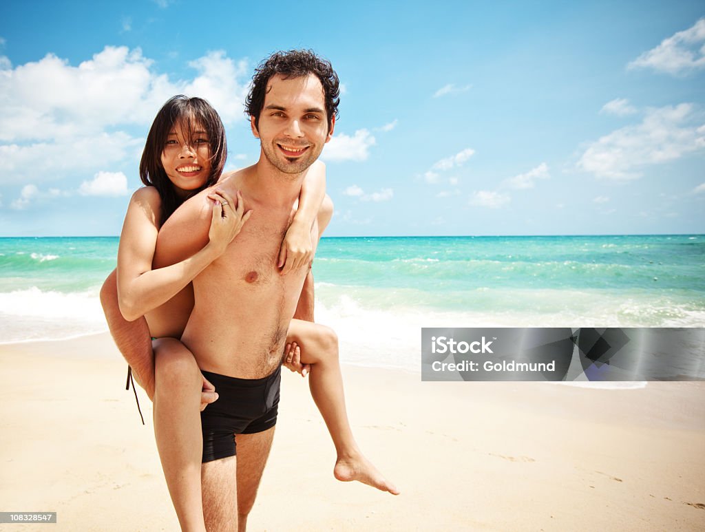Couple on a Beach  Adult Stock Photo