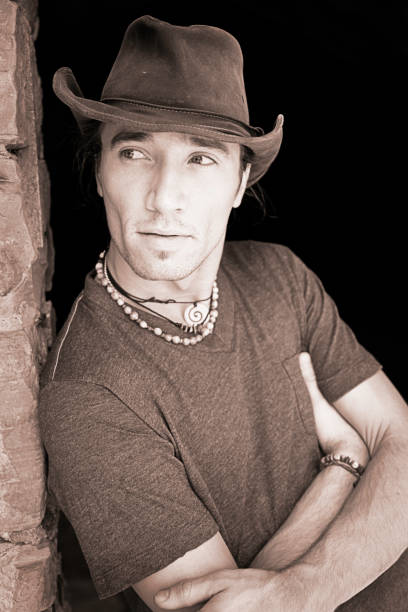 istock Close Up of Rugged Handsome Man by Stone Wall 108328628