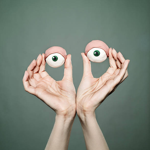 mulher olhos de saibro - play doh balls - fotografias e filmes do acervo