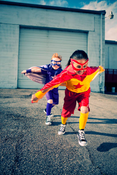 スーパーデュオです。 - partnership creativity superhero child ストックフォトと画像