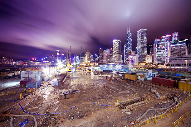 edificio in costruzione - hong kong night motion city foto e immagini stock