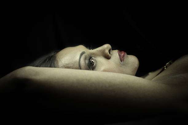 istock Woman Reclining in Dark 108329030
