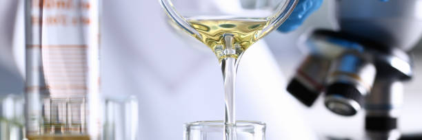 istock Yellow liquid spilled petrol additive innovative supply 1083290868