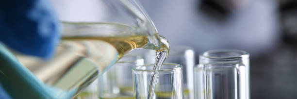 istock Yellow liquid spilled petrol additive innovative supply 1083290890