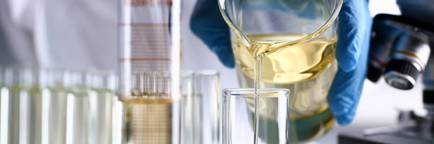istock Yellow liquid spilled petrol additive innovative supply 1083290896