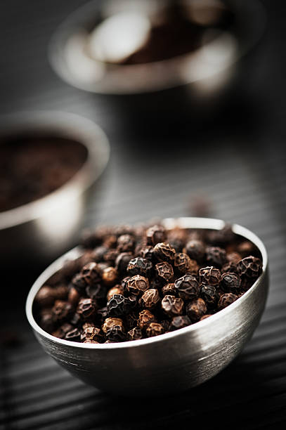 Black pepper corns  black peppercorn photos stock pictures, royalty-free photos & images