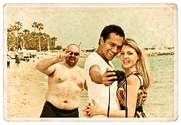 Photobomber Photobomber spoiling a holiday photo. photo bomb stock pictures, royalty-free photos & images