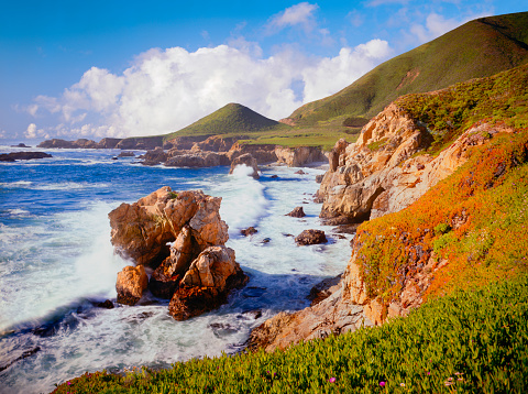 Big Sur Coast Of California With Waves  Of The Pacific Ocean Crashing Against Rocky Shores