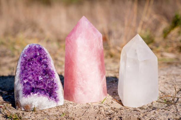 istock Golden Triangle gemstones: amethyst, rose quartz and white quartz 1083299600