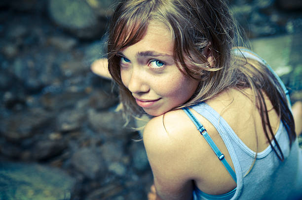 close up of young woman fresh out of the water
