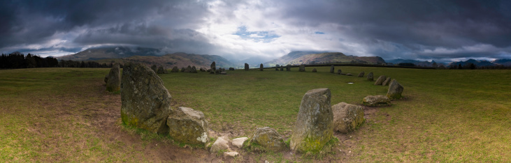 Part of the Glendalough Monastery Cemetery. In the background, the misty landscape of the surrounding hills.