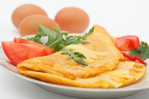 istock Closeup of omelette stuffed with ham and cheese 1083303102