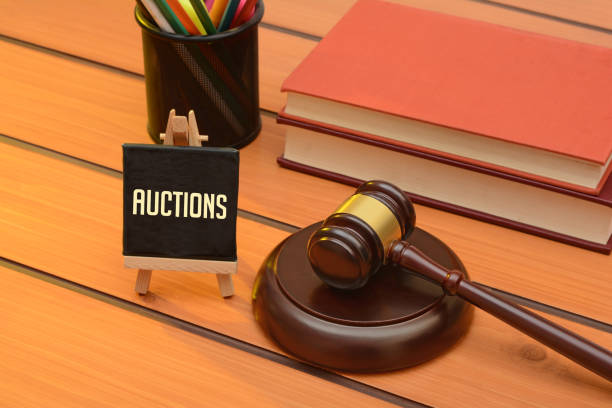 istock Auction with Wooden Gavel on table, law background 1083304508