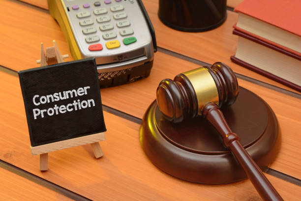 istock Consumer protection theme with wooden gavel on table, law background 1083304526