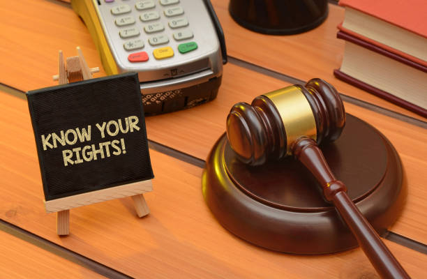 istock Know your rights theme with wooden gavel on table, law background 1083304632