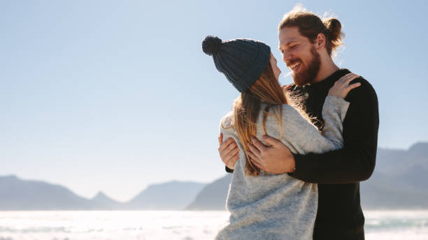 istock Couple enjoying a lovely time on the beach 1083312266