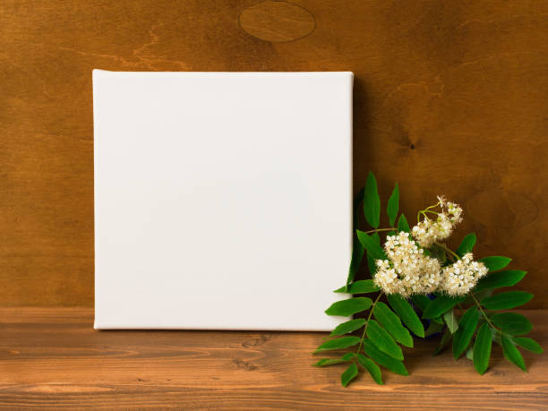 istock Mock up poster frame. Blank square canvas. Wooden wall and floor on background. 1083312744